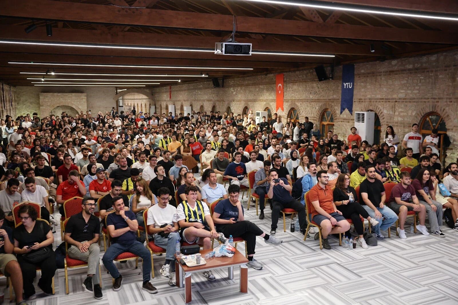 A packed event inside the Tarihi Hamam on YTU's Davutpaşa Campus